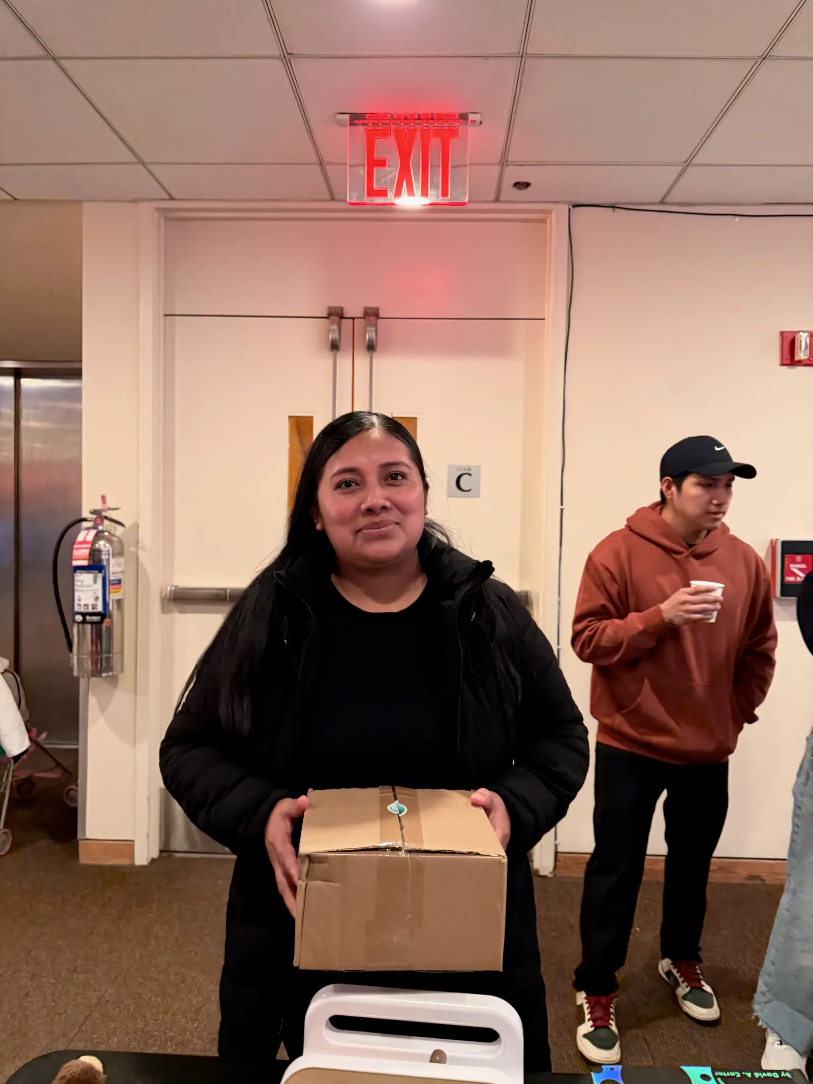 A mother holding her MintBox.