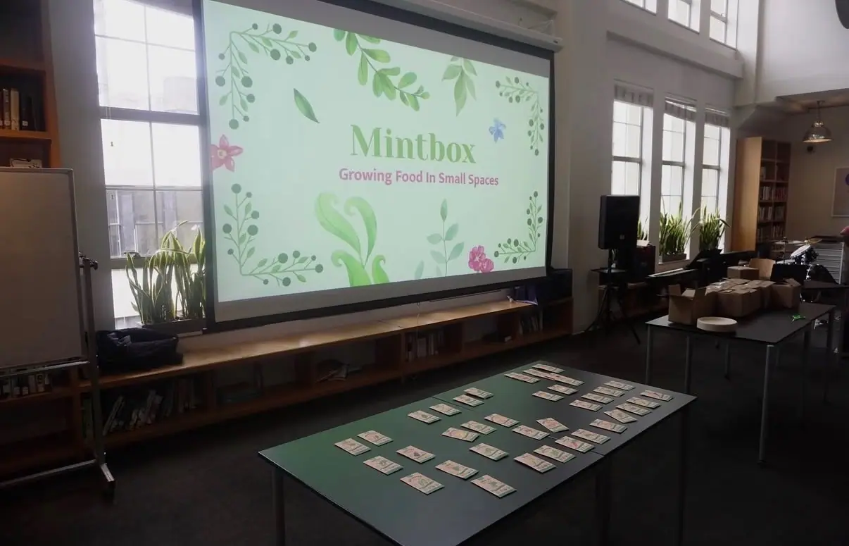 The Growing Food in Small Spaces presentation with seed cards laid out.